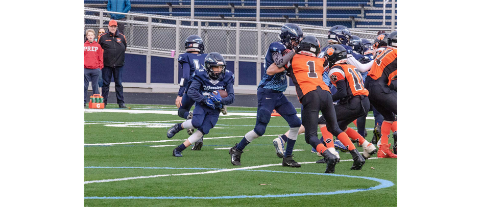 Wilton Tackle Football In Action